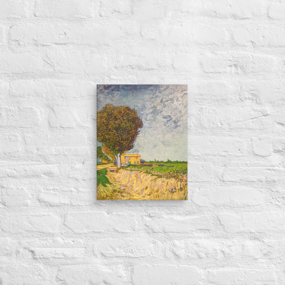 Van Gogh's 'A Lane near Arles' on a 11"x14" unframed canvas print on a white brick wall.