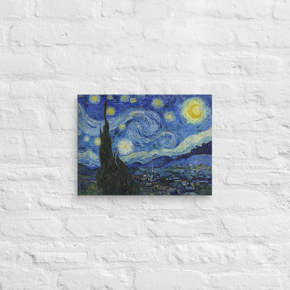 Van Gogh's 'Starry Night' on a 12"x16" unframed canvas print on a white brick wall.