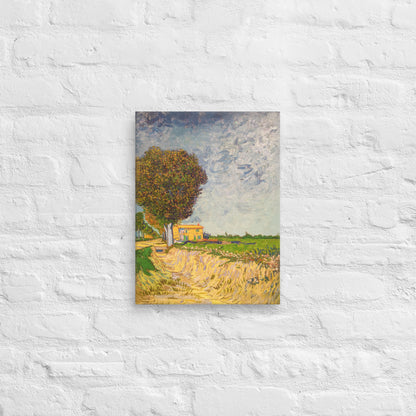 Van Gogh's 'A Lane near Arles' on a 12"x16" unframed canvas print on a white brick wall.