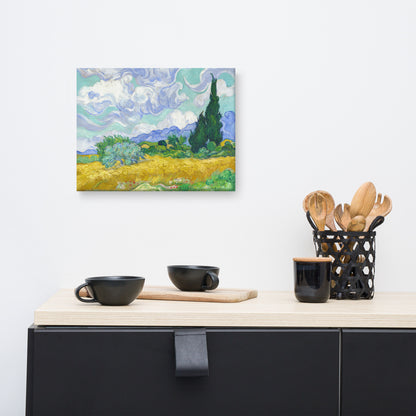 Van Gogh's 'Wheat Field with Cypresses' on a 12"x16" unframed canvas print on a white wall above a kitchen counter with cooking supplies.