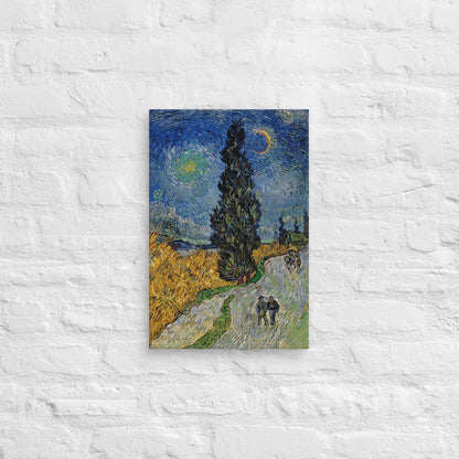 Van Gogh's 'Road with Cypress and Star' on a 12"x18" unframed canvas print on a white brick wall.