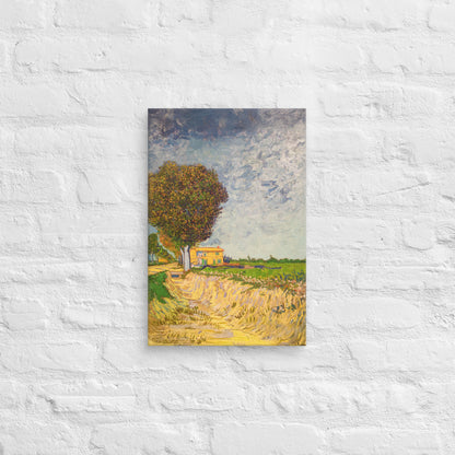 Van Gogh's 'A Lane near Arles' on a 12"x18" unframed canvas print on a white brick wall.
