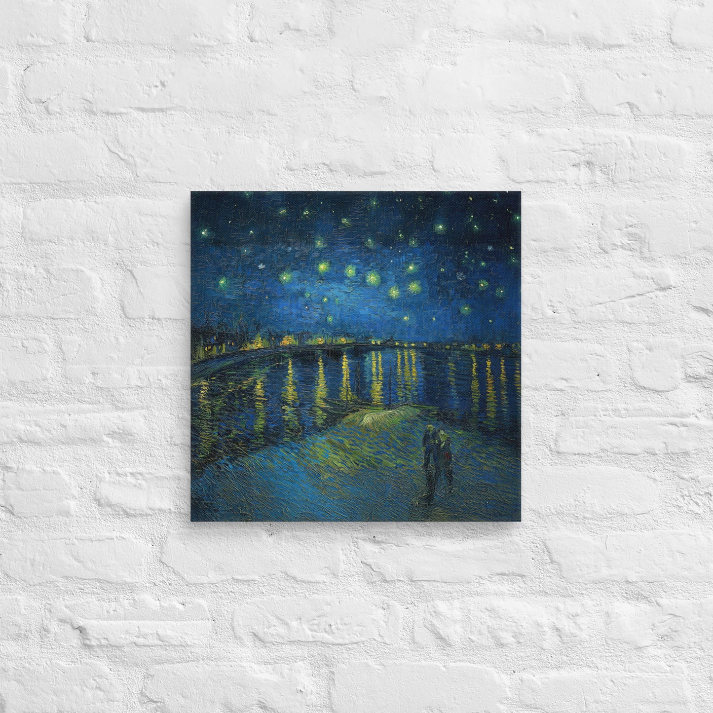 Van Gogh's 'Starry Night Over the Rhone' on a 16"x16" unframed canvas print on a white brick wall.