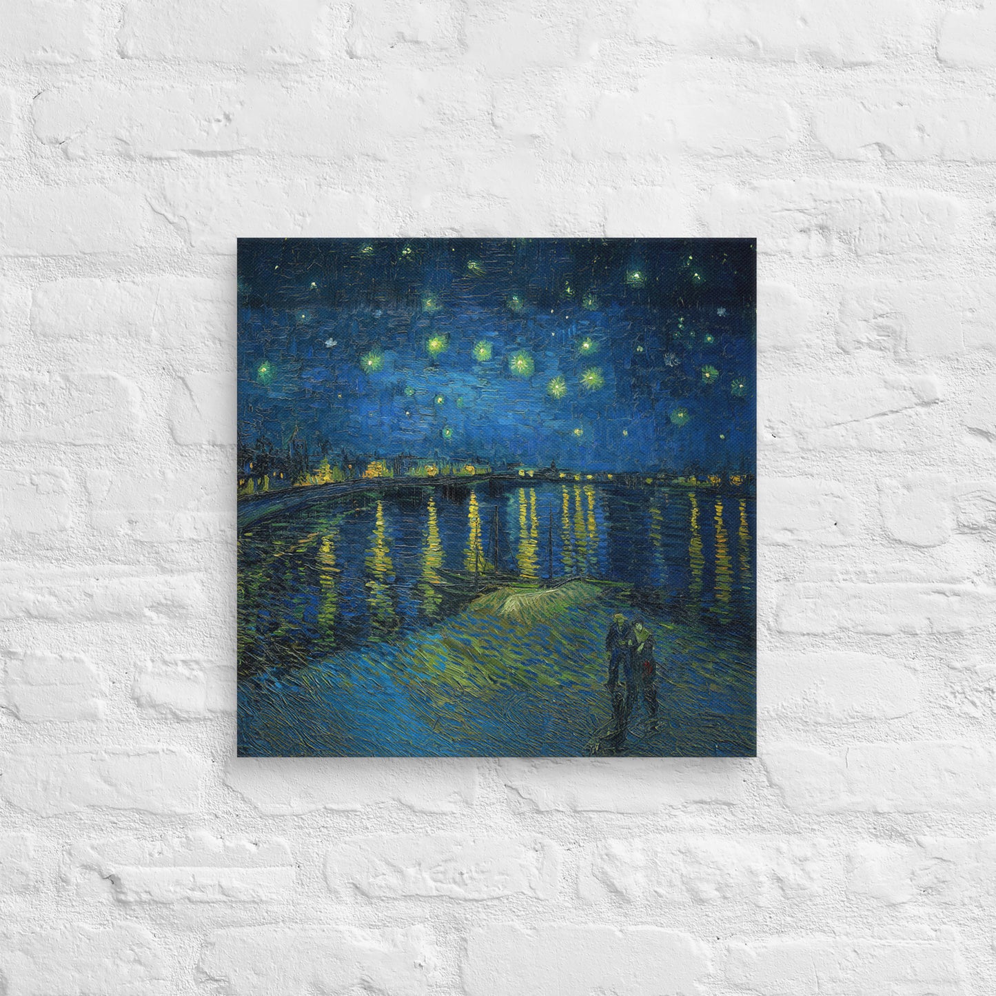 Van Gogh's 'Starry Night Over the Rhone' on a 18"x18" unframed canvas print on a white brick wall.
