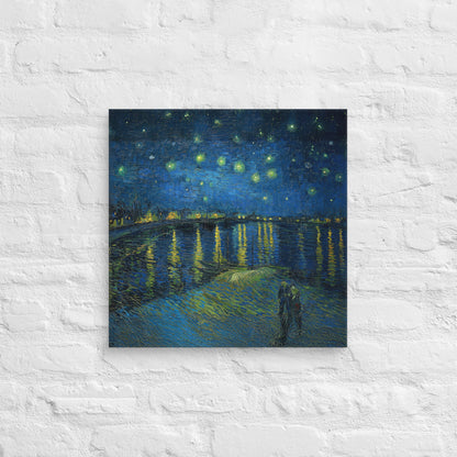 Van Gogh's 'Starry Night Over the Rhone' on a 18"x18" unframed canvas print on a white brick wall.