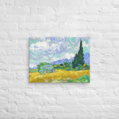 Van Gogh's 'Wheat Field with Cypresses' on a 18"x24" unframed canvas print on a white brick wall.