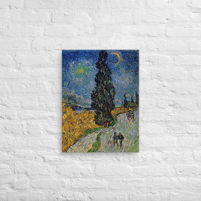 Van Gogh's 'Road with Cypress and Star' on a 18"x24" unframed canvas print on a white brick wall.