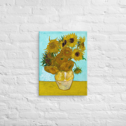 Van Gogh's 'Vase with Twelve Sunflowers' on a 18"x24" unframed canvas print on a white brick wall.