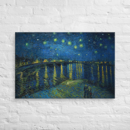 Van Gogh's 'Starry Night Over the Rhone' on a 24"x36" unframed canvas print on a white brick wall.