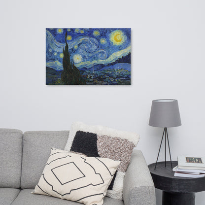 Van Gogh's 'Starry Night' on a 24"x36" unframed canvas print on a white wall above a gray sofa with throw pillows and side table with a lamp.