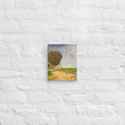Van Gogh's 'A Lane near Arles' on a 8"x10" unframed canvas print on a white brick wall.