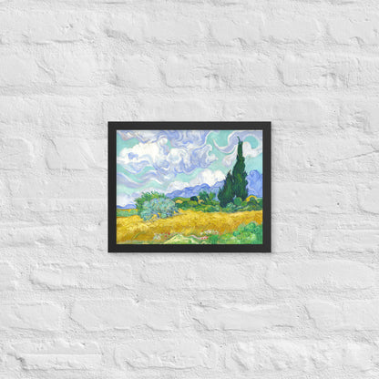 Van Gogh's 'Wheat Field with Cypresses' on a 11"x14" black framed poster print on a white brick wall.