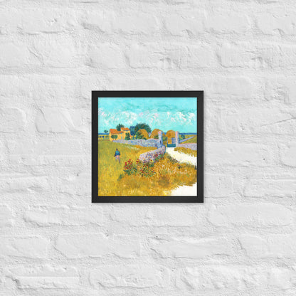 Van Gogh's 'Farmhouse in Provence' on a 12"x12" black framed poster print on a white brick wall.