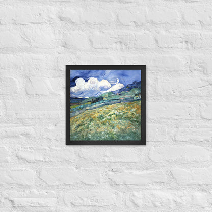 Van Gogh's 'Landscape from Saint-Rémy' on a 12"x12" black framed poster print on a white brick wall.
