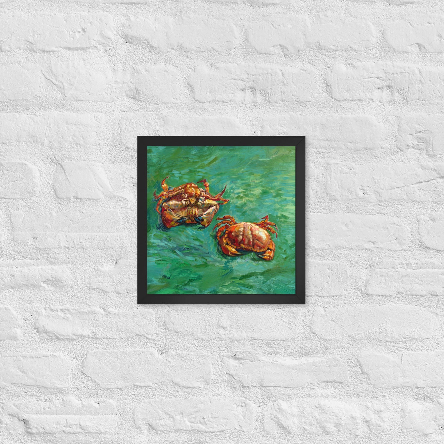 Van Gogh's 'Two Crabs' on a 12"x12" black framed poster print on a white brick wall.
