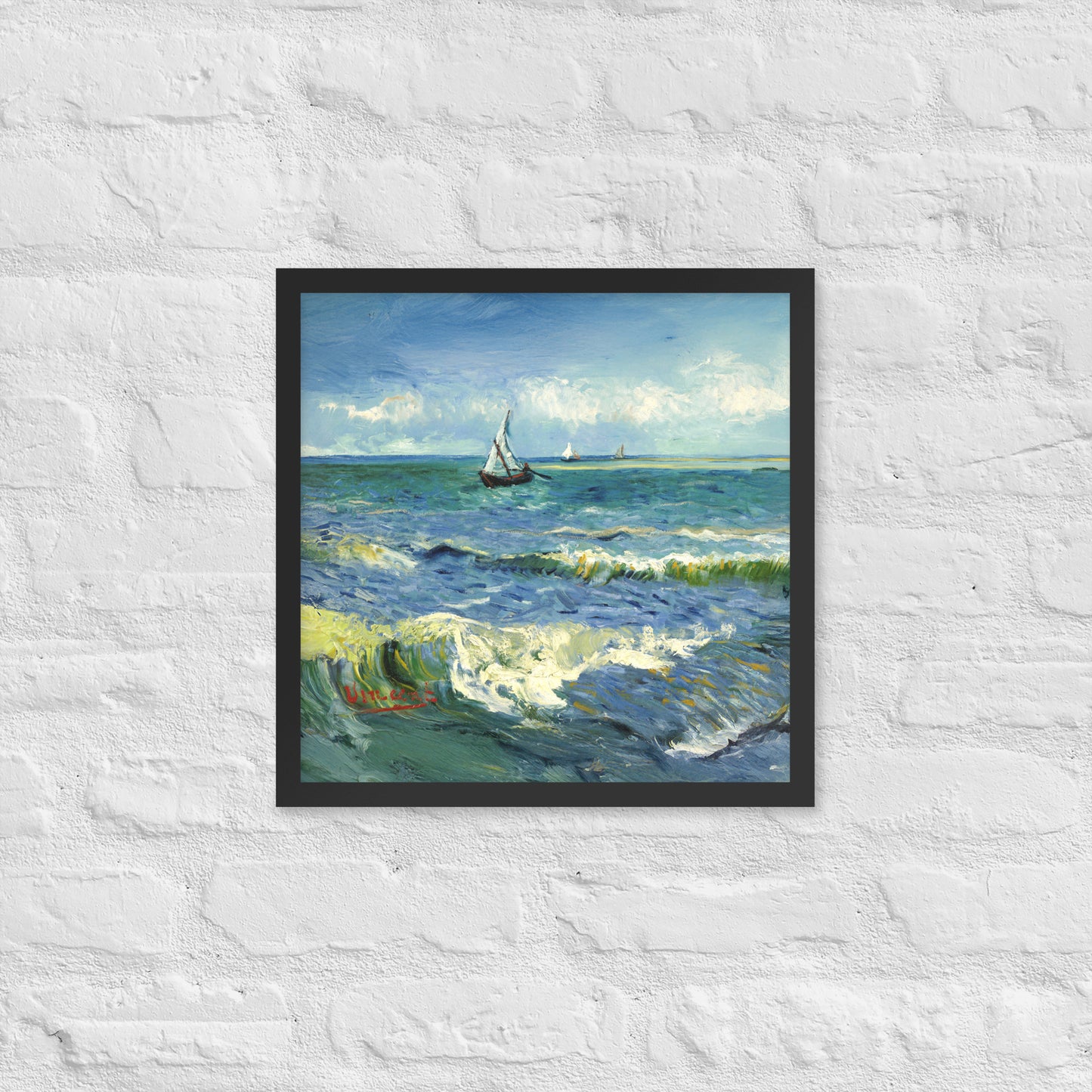 Van Gogh's 'The Sea at Les Saintes-Maries-de-la-Mer' on a 16"x16" black framed poster print on a white brick wall.