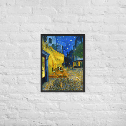 Van Gogh's 'Café Terrace at Night' on a 18"x24" black framed poster print on a white brick wall.