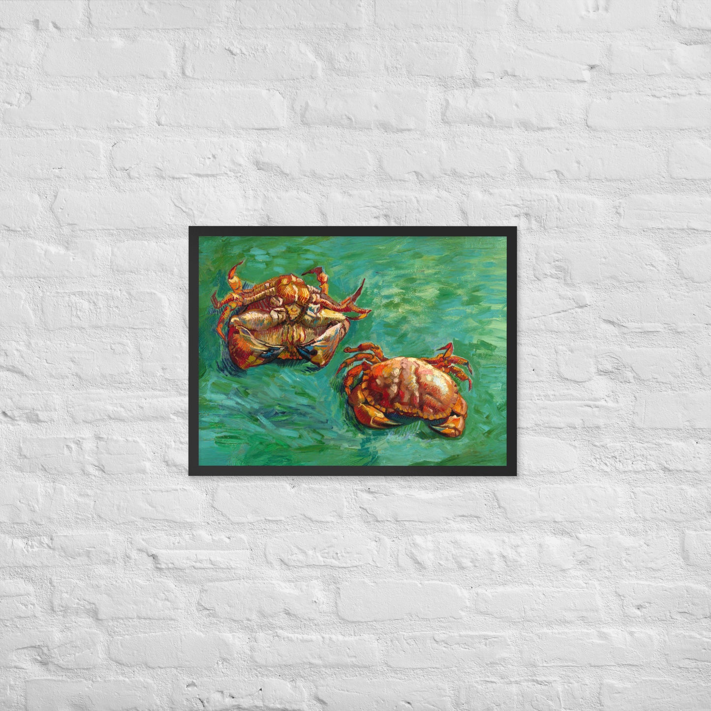 Van Gogh's 'Two Crabs' on a 18"x24" black framed poster print on a white brick wall.