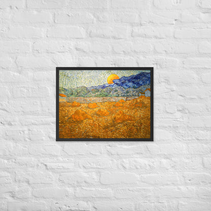 Van Gogh's 'Landscape with Wheat Sheaves and Rising Moon' on a 18"x24" black framed poster print on a white brick wall.