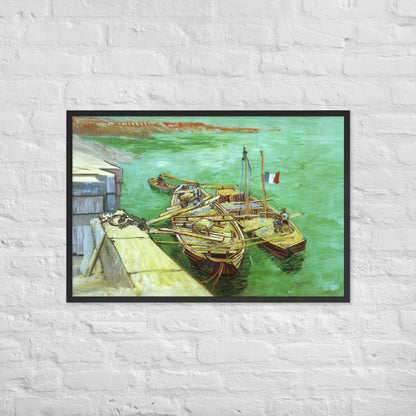 Van Gogh's 'Quay with Men Unloading Sand Barges' on a 24"x36" black framed poster print on a white brick wall.