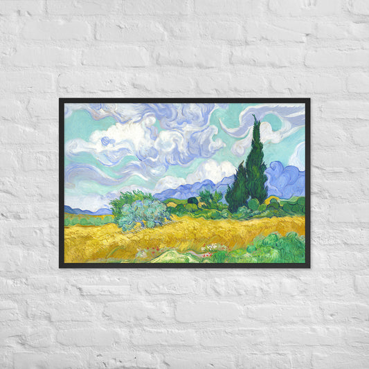 Van Gogh's 'Wheat Field with Cypresses' on a 24"x36" black framed poster print on a white brick wall.