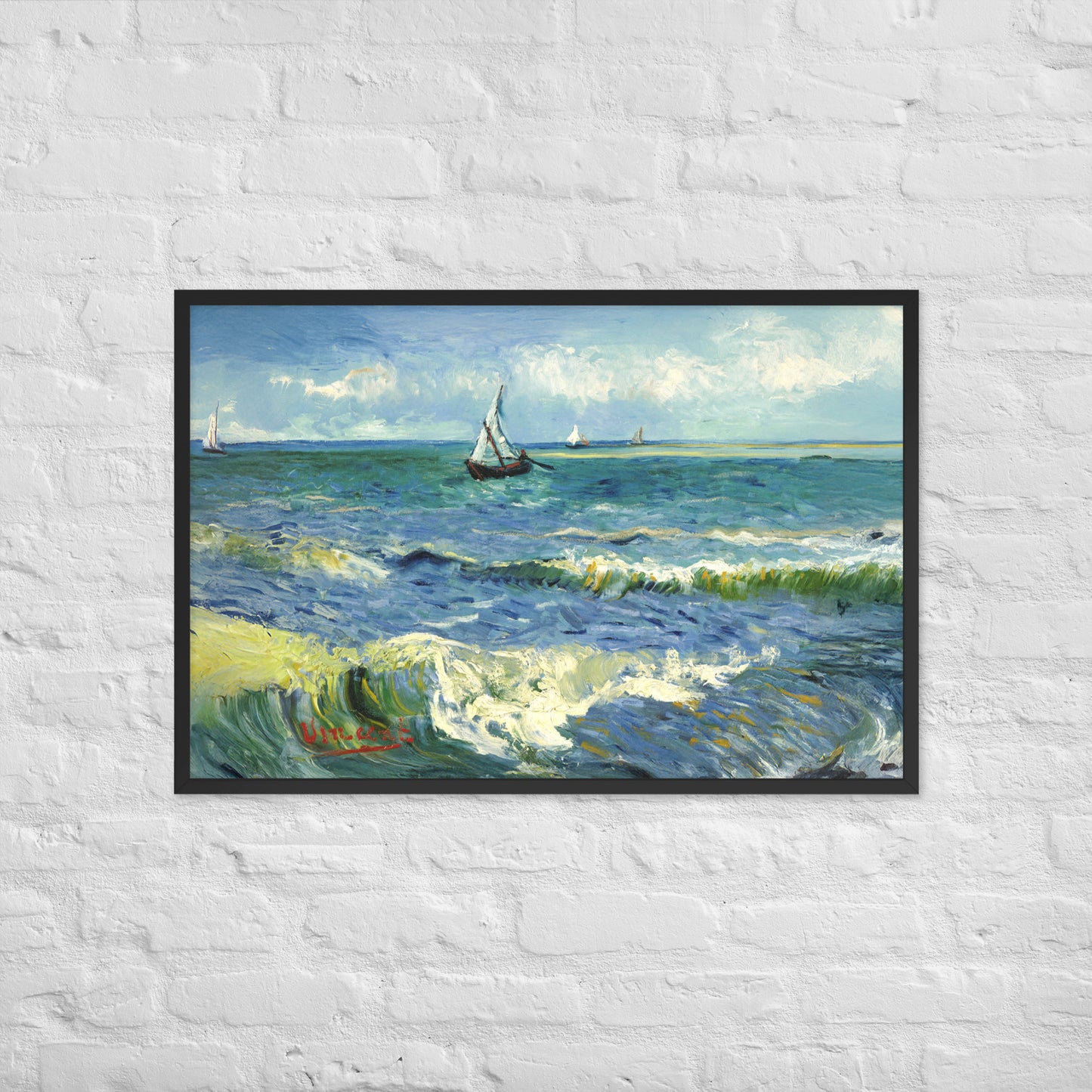 Van Gogh's 'The Sea at Les Saintes-Maries-de-la-Mer' on a 24"x36" black framed poster print on a white brick wall.