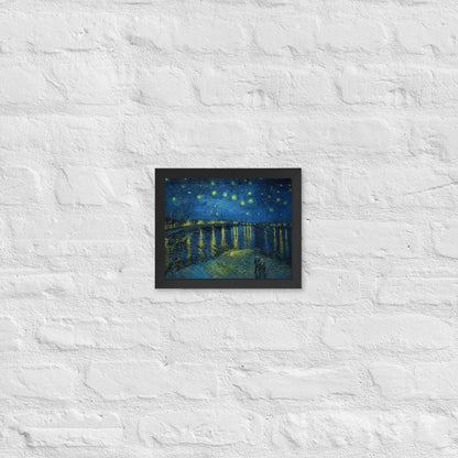 Van Gogh's 'Starry Night Over the Rhone' on a 8"x10" black framed poster print on a white brick wall.
