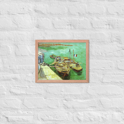 Van Gogh's 'Quay with Men Unloading Sand Barges' on a 11"x14" red oak framed poster print on a white brick wall.