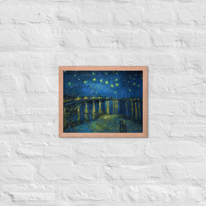 Van Gogh's 'Starry Night Over the Rhone' on a 11"x14" red oak framed poster print on a white brick wall.