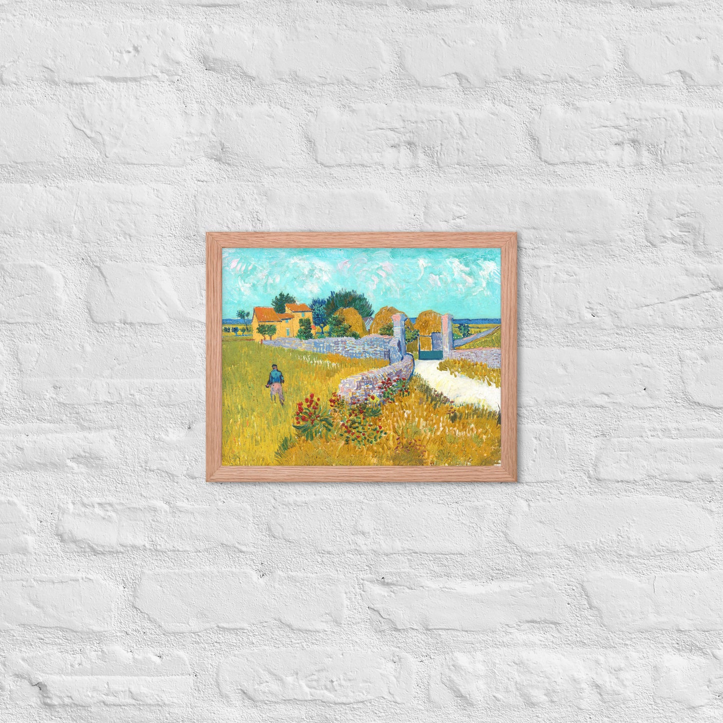 Van Gogh's 'Farmhouse in Provence' on a 11"x14" red oak framed poster print on a white brick wall.