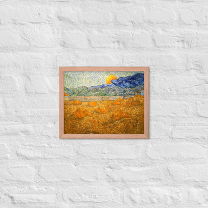 Van Gogh's 'Landscape with Wheat Sheaves and Rising Moon' on a 11"x14" red oak framed poster print on a white brick wall.