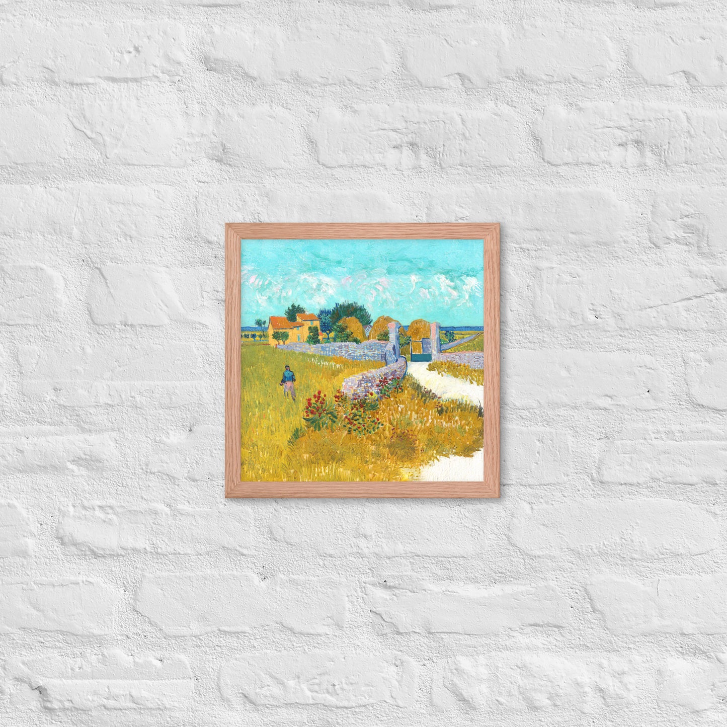 Van Gogh's 'Farmhouse in Provence' on a 12"x12" red oak framed poster print on a white brick wall.
