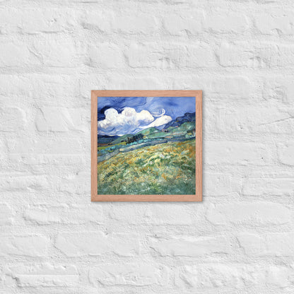 Van Gogh's 'Landscape from Saint-Rémy' on a 12"x12" red oak framed poster print on a white brick wall.