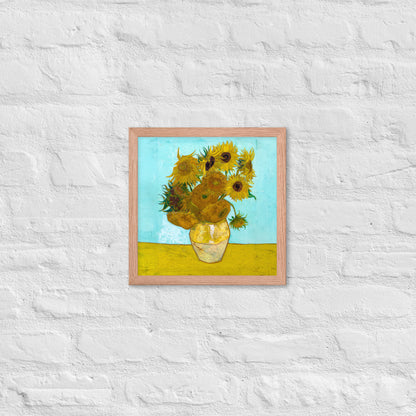 Van Gogh's 'Vase with Twelve Sunflowers' on a 12"x12" red oak framed poster print on a white brick wall.