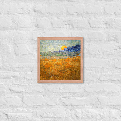 Van Gogh's 'Landscape with Wheat Sheaves and Rising Moon' on a 12"x12" red oak framed poster print on a white brick wall.