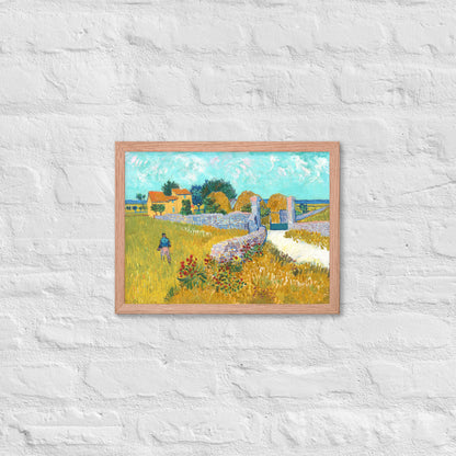 Van Gogh's 'Farmhouse in Provence' on a 12"x16" red oak framed poster print on a white brick wall.