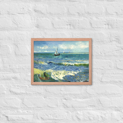 Van Gogh's 'The Sea at Les Saintes-Maries-de-la-Mer' on a 12"x16" red oak framed poster print on a white brick wall.