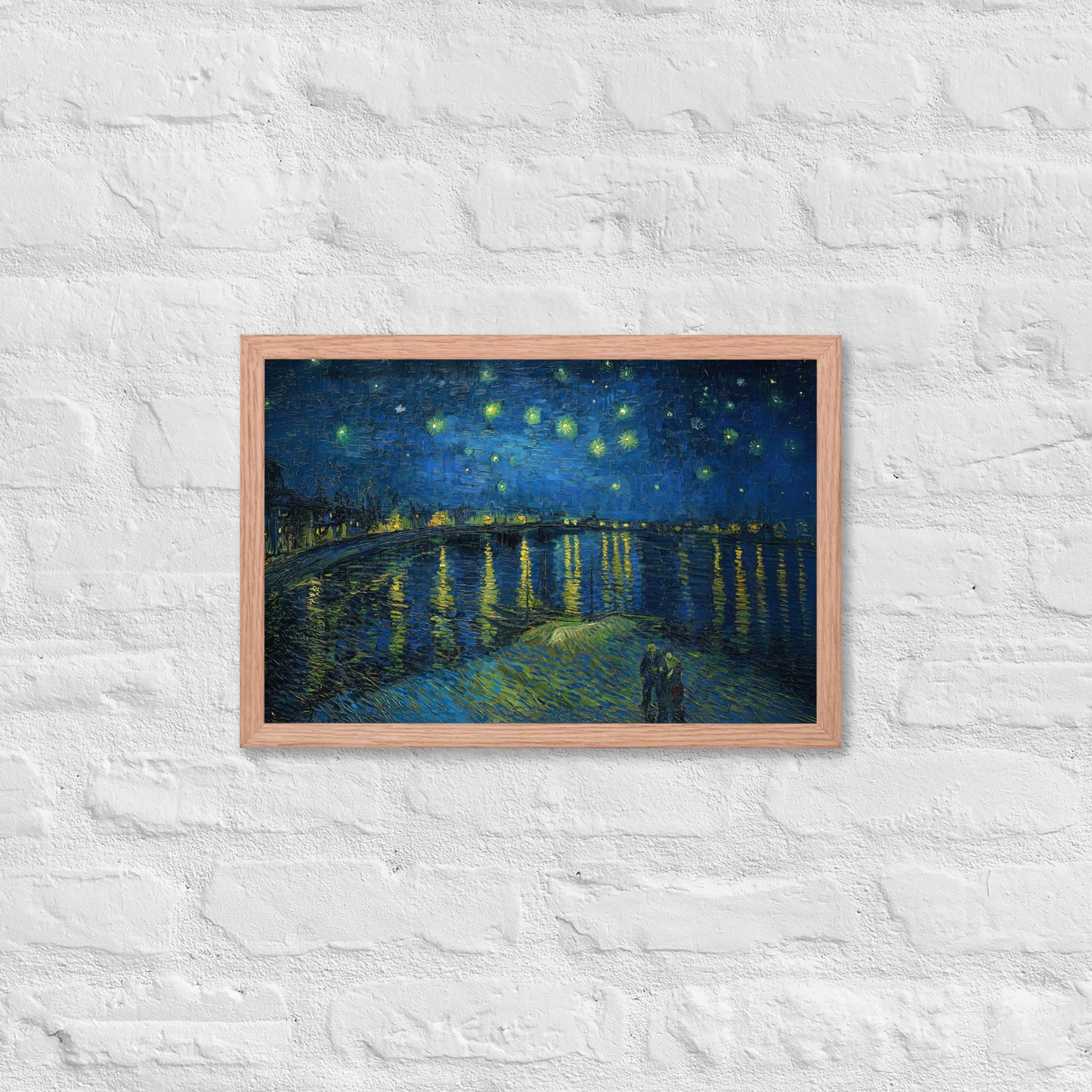 Van Gogh's 'Starry Night Over the Rhone' on a 12"x18" red oak framed poster print on a white brick wall.