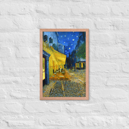 Van Gogh's 'Café Terrace at Night' on a 12"x18" red oak framed poster print on a white brick wall.