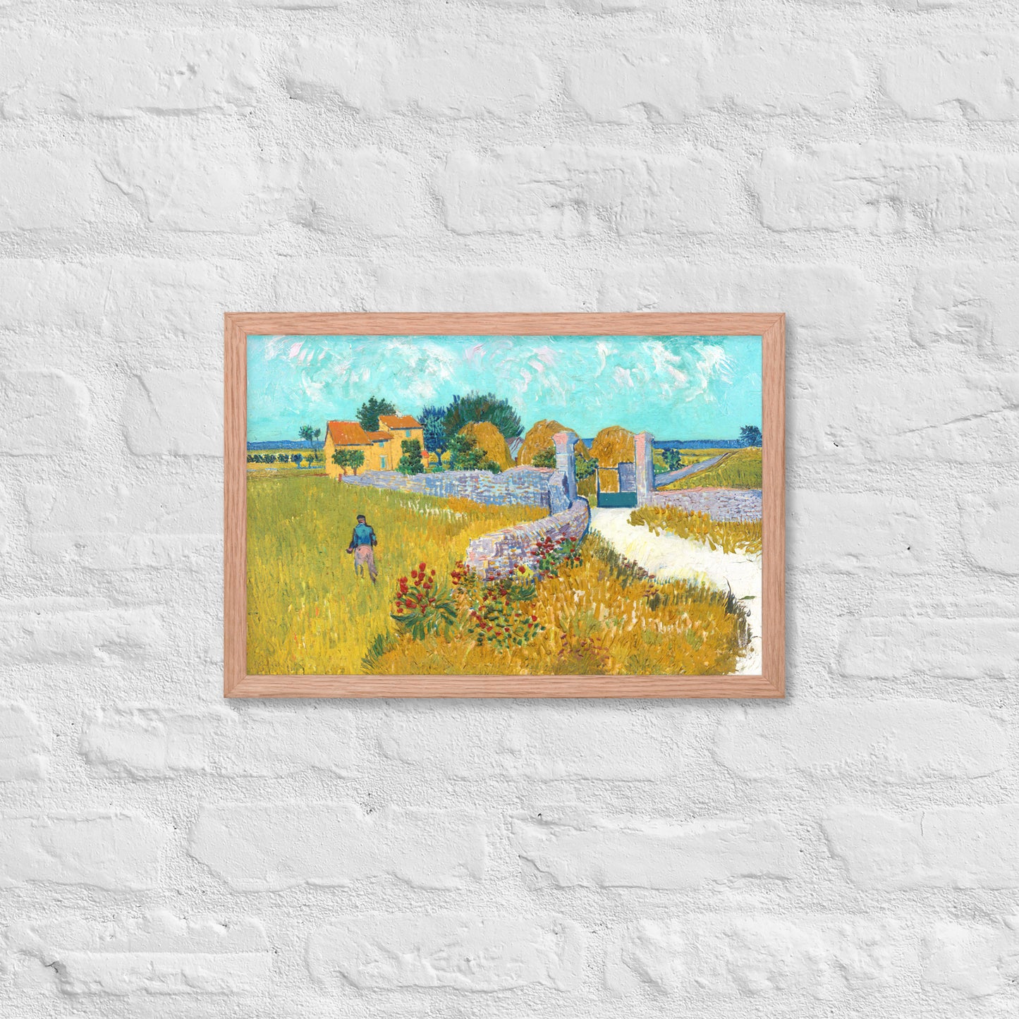 Van Gogh's 'Farmhouse in Provence' on a 12"x18" red oak framed poster print on a white brick wall.