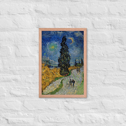 Van Gogh's 'Road with Cypress and Star' on a 12"x18" red oak framed poster print on a white brick wall.