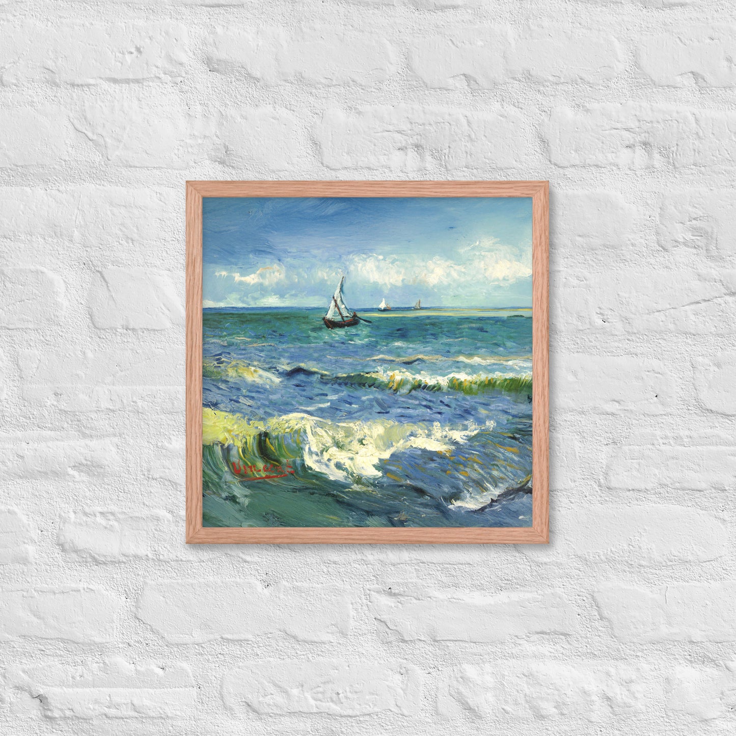 Van Gogh's 'The Sea at Les Saintes-Maries-de-la-Mer' on a 16"x16" red oak framed poster print on a white brick wall.