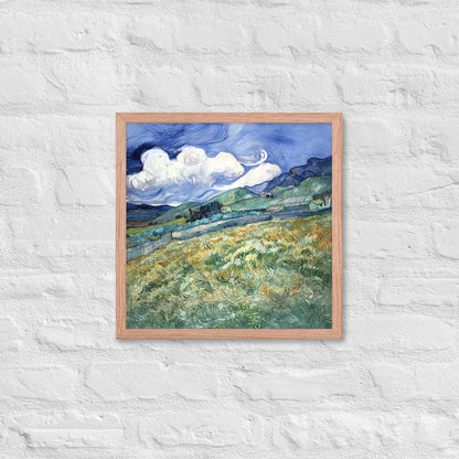 Van Gogh's 'Landscape from Saint-Rémy' on a 16"x16" red oak framed poster print on a white brick wall.
