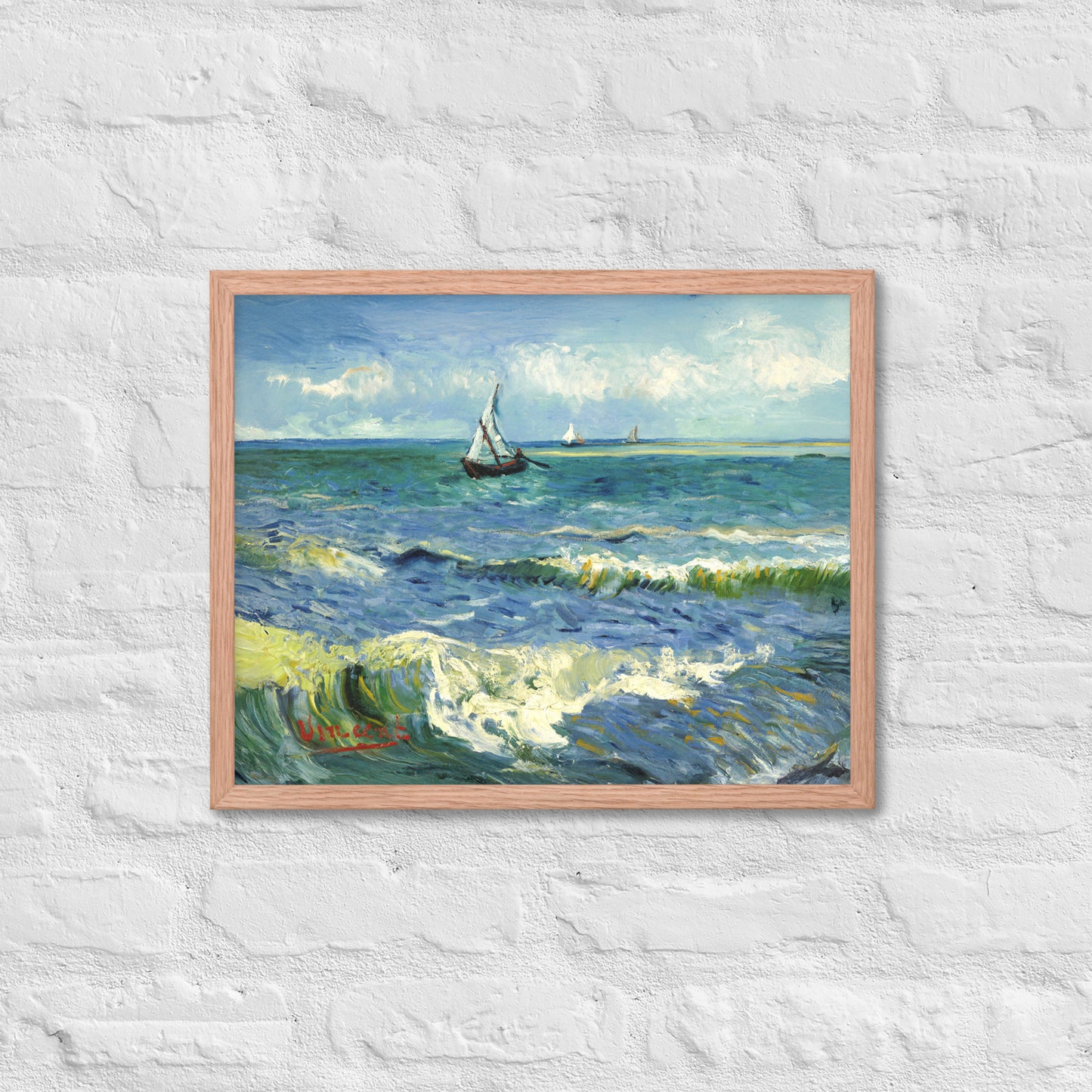 Van Gogh's 'The Sea at Les Saintes-Maries-de-la-Mer' on a 16"x20" red oak framed poster print on a white brick wall.
