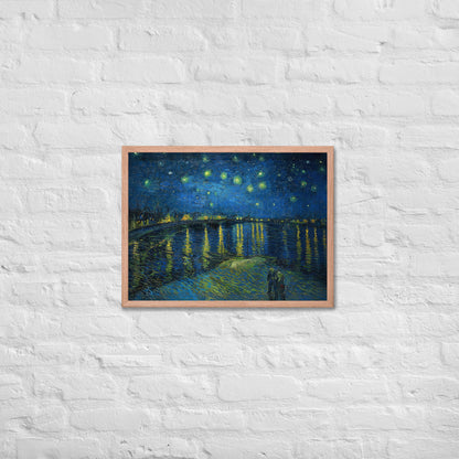Van Gogh's 'Starry Night Over the Rhone' on a 18"x24" red oak framed poster print on a white brick wall.