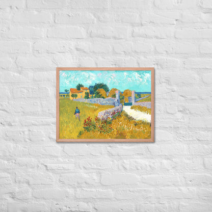 Van Gogh's 'Farmhouse in Provence' on a 18"x24" red oak framed poster print on a white brick wall.