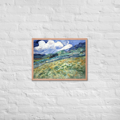 Van Gogh's 'Landscape from Saint-Rémy' on a 18"x24" red oak framed poster print on a white brick wall.