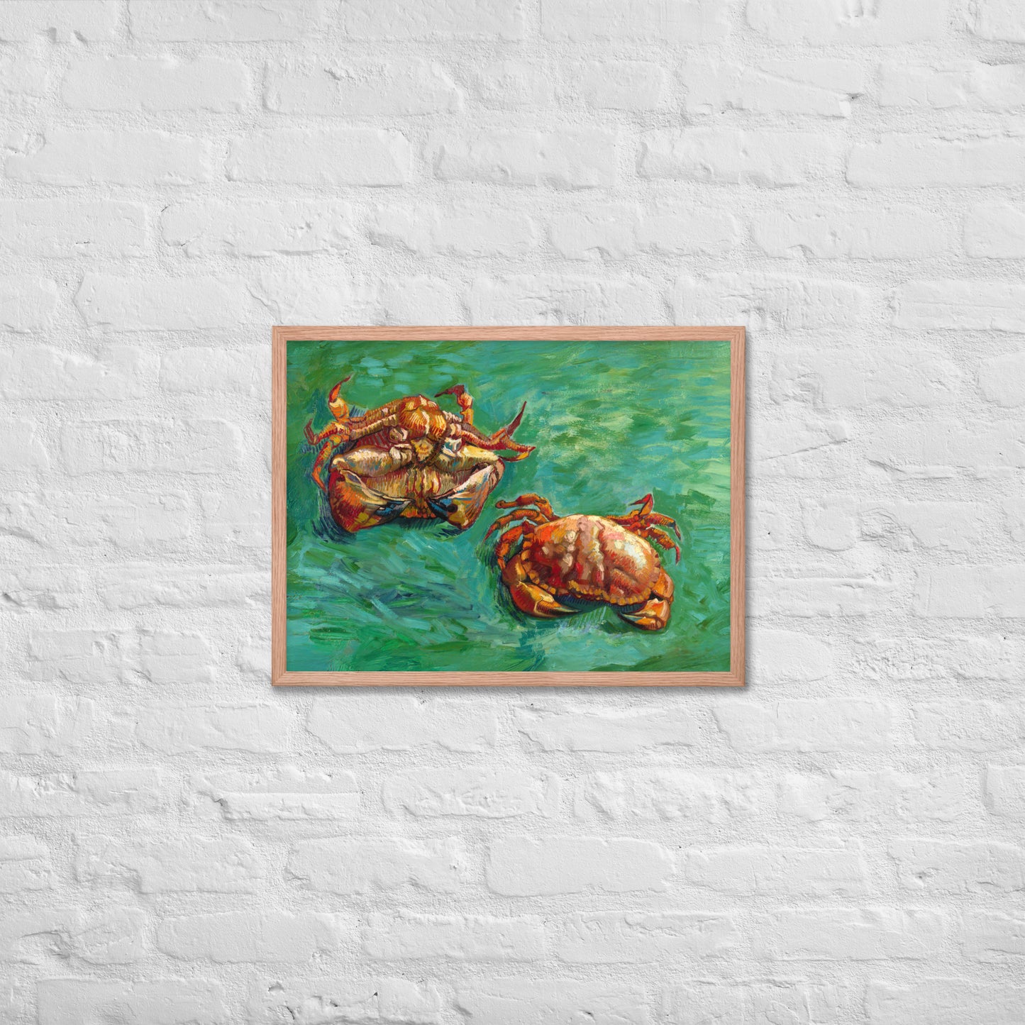 Van Gogh's 'Two Crabs' on a 18"x24" red oak framed poster print on a white brick wall.