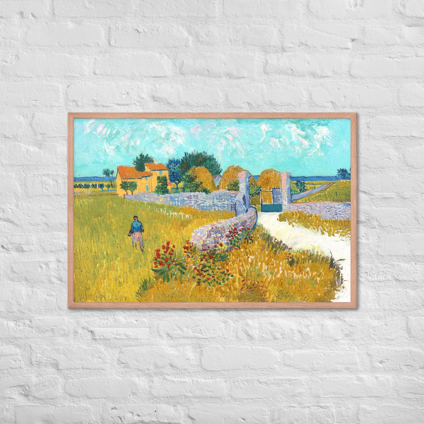 Van Gogh's 'Farmhouse in Provence' on a 24"x36" red oak framed poster print on a white brick wall.