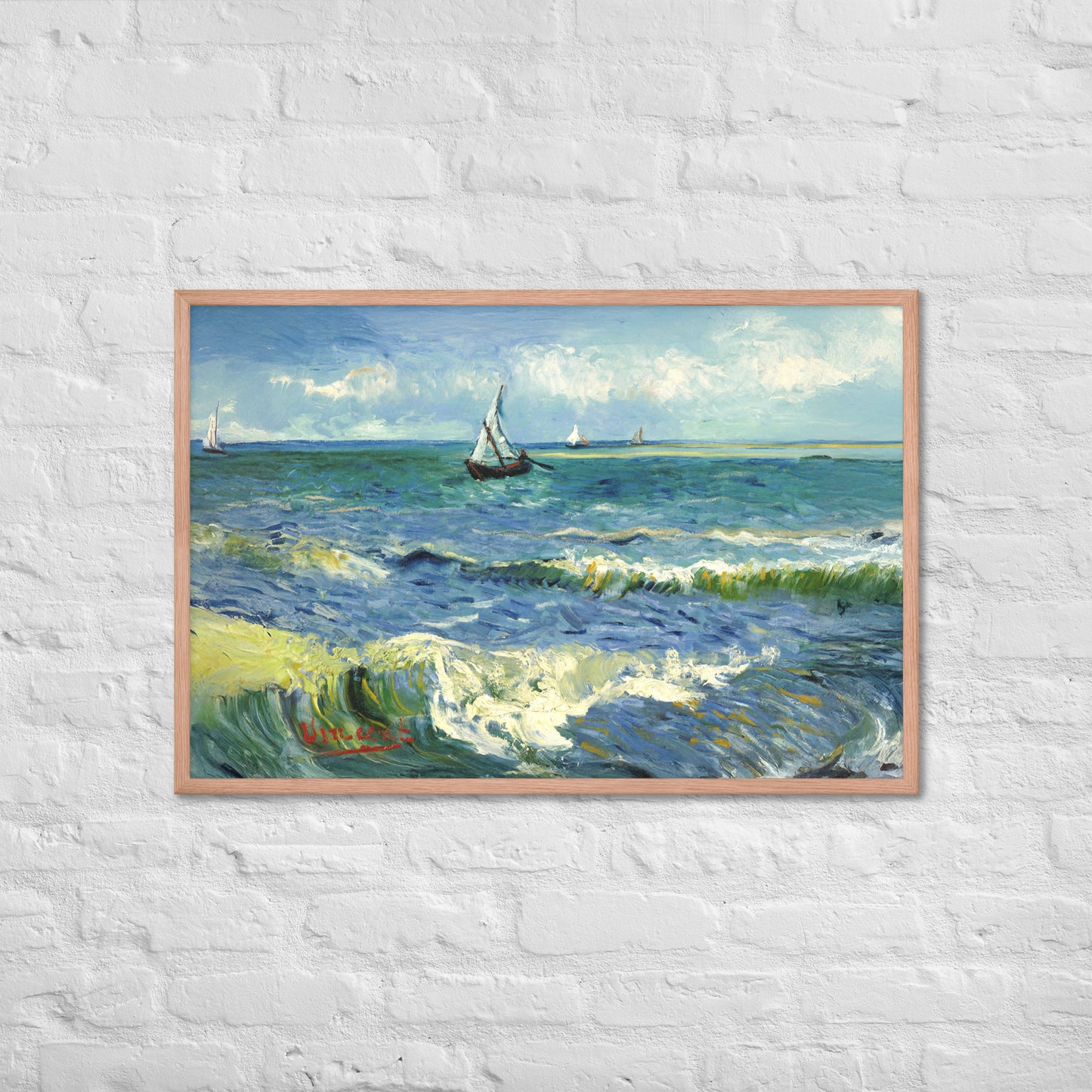 Van Gogh's 'The Sea at Les Saintes-Maries-de-la-Mer' on a 24"x36" red oak framed poster print on a white brick wall.